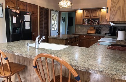 Muncy House | Glade Run House - A quiet country home retreat with a stream running through it.