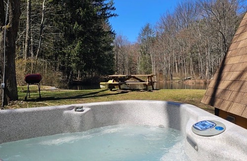 Newfoundland Cabin | Glamp in this Cozy Tiny A-Frame Cabin: Electricity, Heating, AC, Wi-Fi & Hot Tub