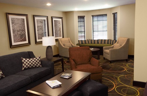 Rossford Condo | Great for Business Travelers! 24h Business Center + Free Breakfast!