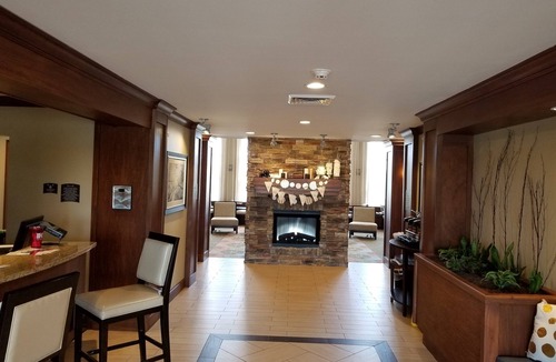 Rossford Condo | Great for Business Travelers! 24h Business Center + Free Breakfast!