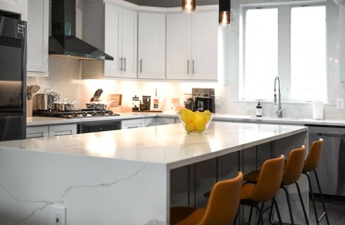 Lower Lawrenceville House | ★ HostWise Stays ★ Rooftop patio, King Bed, Garage Parking, Prime Location!