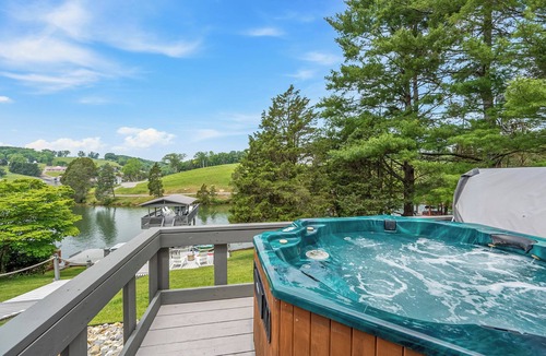 New River House | Hot tub, private dock, with water front lake access for relaxing or exploring.