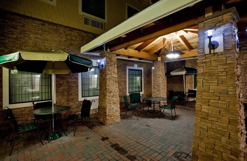 Chesapeake Condo | King Suite. Free Breakfast. Indoor Pool & Hot Tub. Near the Virginia Beach business district!