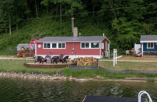 Dowling Cottage | Lake front property with a relaxing front deck overlooking Bristol Lake