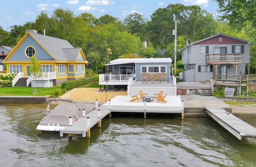 Hewitt House | Lakefront Haven Private Beach Dock Fire Pit Game Room Boat Rental
