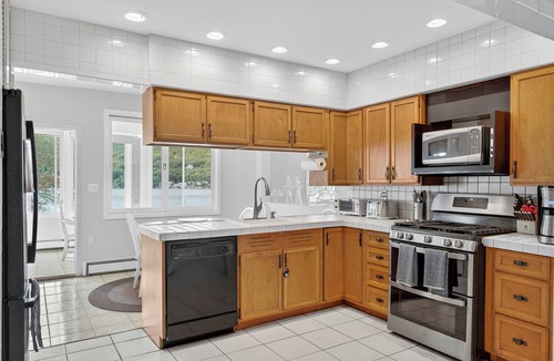 Greenwood Lake House | Lakefront - HotTub, Gameroom, Bar, White Sand Beach, Views, and 15 acres