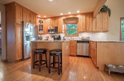 East Stroudsburg House | Lakefront Mansion w/3 Decks, Hot Tub, Boats, & Game Room!