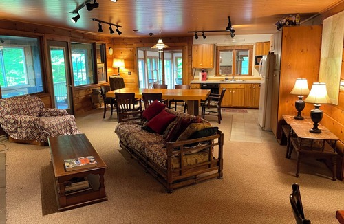 Cedar Run Cabin | Large family mountain retreat on Buck Run with a stocked pond in Leetonia Pa.