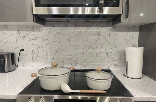 West New York Apartment | Luxurious and Spacious Apt with King Bed and Free Indoor Parking-20 Min to NYC