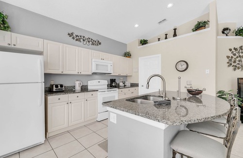 Windsor Palms Villa | Luxury 4BR/3BA Windsor Palms Villa, Woodland Views, Sun-Filled Pool Deck