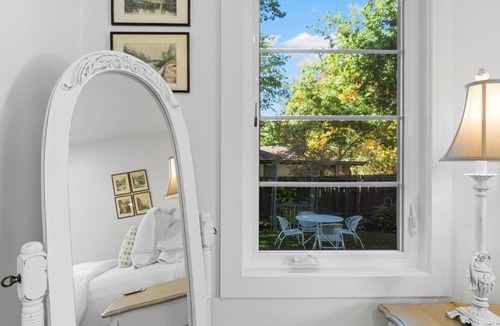 Collister House | Luxury at its Finest | Indulge in Gourmet Kitchen, Spacious Dining Area, Lovely Patio & Plush Beds