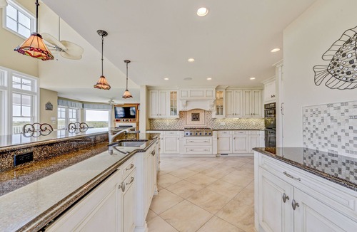 Southend House | Luxury Ocean Front Mansion with Heated Pool, Elevator, Grill and Suites Galore