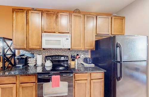 Millville House | Millville by the Sea three-story home with resort amenities & screened patio