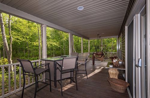 Galloway House | Modern waterfront fireplace in bedroom/bath jetted tub walk in shower no steps