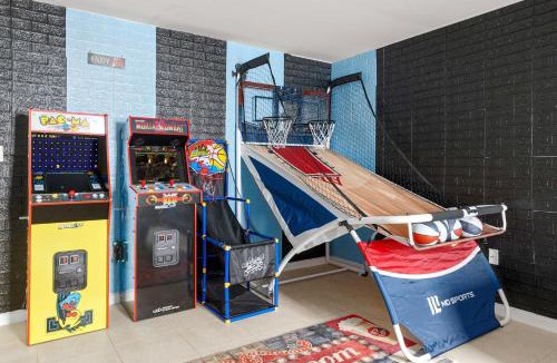 Newark House | Newark Gem Ruby 3BR, 3BA - Sleeps 14 - Walk to Prudential Center and Newark Penn Station, Near EWR and American Dream Mall, includes Parking - WiFi - Laundry - Backyard - Gym