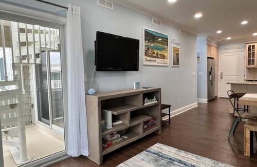 Normandy Beach Condo | Newly Renovated, Beachfront Family Oasis with Private Guarded Beach and Pool