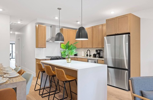 McGinley Square House | NYC Traveler's Dream: 3BR Designer Home with Quick PATH Access to Manhattan!