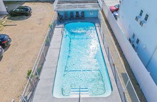 Sussex County House | Ocean Block Townhouse in Dewey Beach – 4 Decks, Pool, Steps to the Sand!