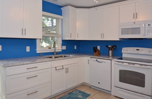 The Pines House | Pet Friendly North Rehoboth Ocean Block 5BR Home Steps to the Beach w/Large Porch