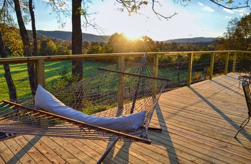 Alix Cabin | Picturesque perch next to the Mulberry River with instant access to Oark AR!