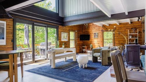 New Paltz House | PoolHot Tub Firepit Near Hikes Shops Dining Cragswood Lodge by AvantStay