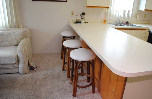 Caine Woods Condo | Quaint, but pristine 2-bedroom condo with free WiFi and an outdoor pool located uptown on the bayside in a peaceful, family-friendly neighborhood!