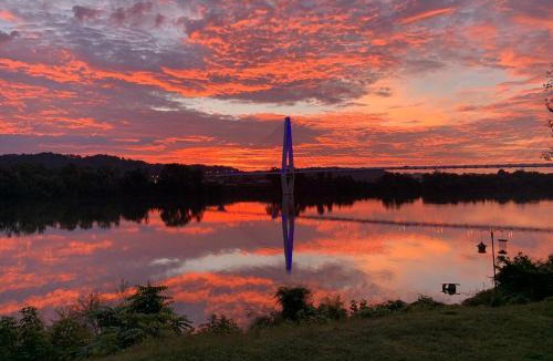 Russell House | Relax at Rivertime with a Bridge and River view, plus a HotTub
