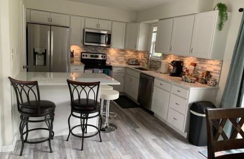 Elizabethtown House | School Village Walk-in shower and jetted tub