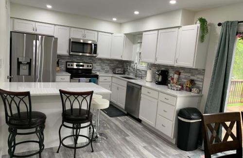 Elizabethtown House | School Village Walk-in shower and jetted tub