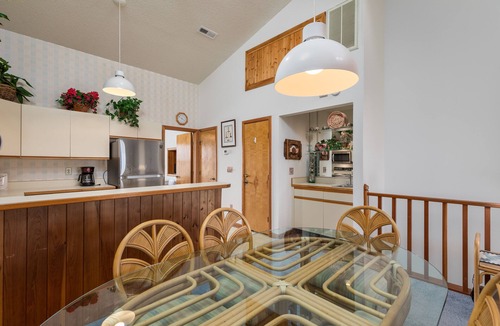 Kitty Hawk Condo | Sea Dunes condo with community pool and tennis, beach access, porch swing, baby gate, and WiFi