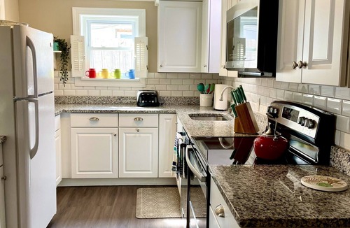 Rehoboth by the Sea Cottage | Serenity Amid it All. Dog friendly PET FEE, WiFi, outdoor shower, grill