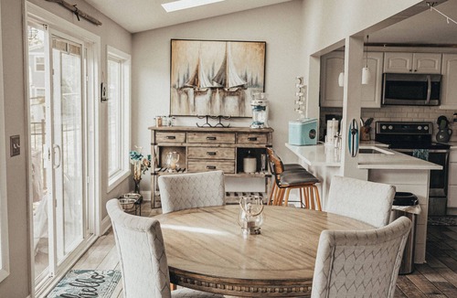 Portage Lakes Cottage | SLICE OF HEAVEN lake front cottage with HOTTUB, fire pit, kayaks & Dog friendly!