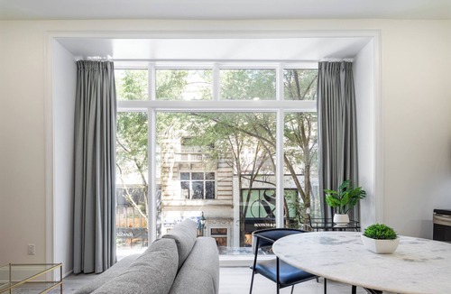 Rittenhouse Row Apartment | Sosuite | Penthouse 1BR Apt w Arch Windows, W/D