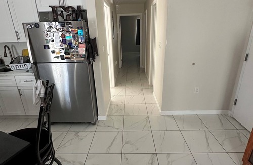 Eastchester Apartment | Spacious 3-bedroom suite with AC/heat, WiFi, utilities, housekeeping included.