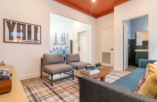 Buena Vista Apartment | Spacious 4BR | 2 Living Rooms + Putting Green & Balcony | Downtown | Vinyl House