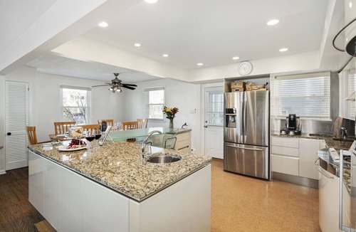 Gardens House | Steps from the pristine Gardens beach. A rare find. Welcome to The Seagate.