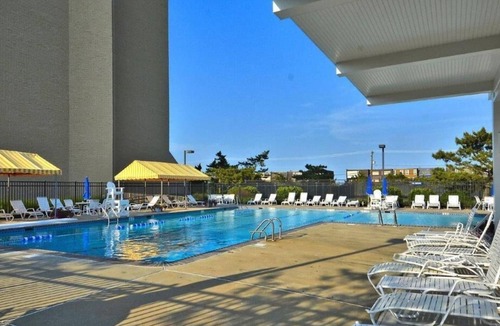 North Shores House | Steps from the Ocean! Renovated Townhome with Pool, Beach & Private Yard