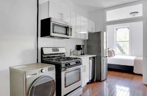 Chinatown Apartment | Sunlit LES 1BR w/W/D, steps to B/D train, by Blueground