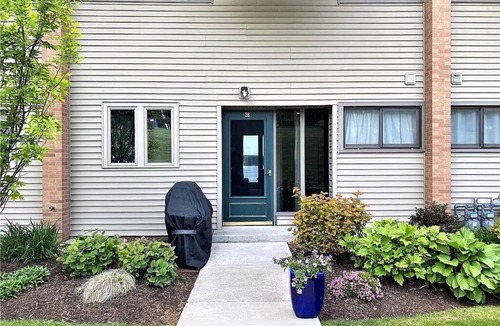 Dewittville Condo | Sunset Shores Family-Friendly Lake Condo in Mayville Pool, AC, Private Deck!