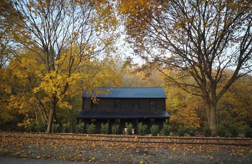 Railroad Cabin | The Creek House: A Creekside Retreat with Hot Tub and Electric Bikes