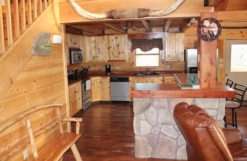 Luray Cabin | This property is located on a 65 acre farm on the Shenandoah River.