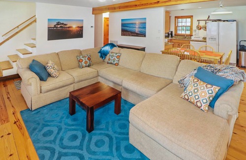 Chincoteague House | Utter East - great home with large screened porch and firepit next to the pond