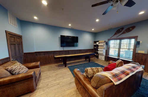 Snowshoe House | Vibrant 8BR Retro Rendezvous with Game Room by RedAwning