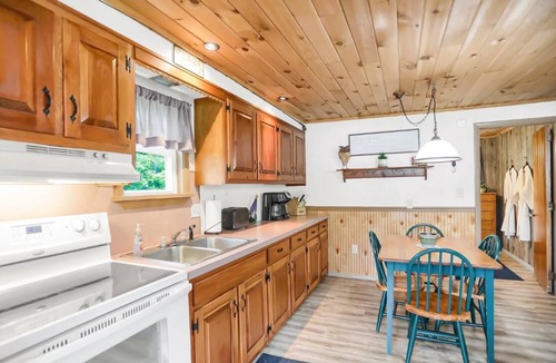 Swengel Cabin | Waterfront cottage with hot tub, & fire pit. Pet friendly.