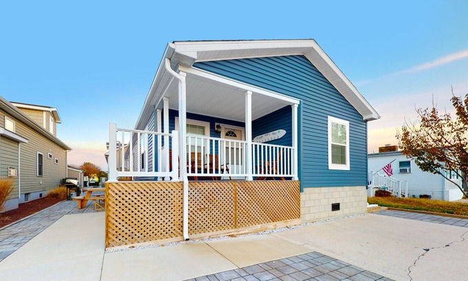 Montego Bay House | Beachy bayside home in quiet neighborhood with patio, central AC, pool, & tennis