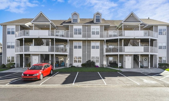 Ocean View Condo | Beautifully decorated 1st floor unit nestled within unspoiled land and gently lapping inland waterways -