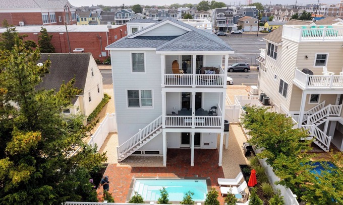 Beach Haven House | New Build w/Heated Pool & Game Room, 0.5 blocks to Fantasy Island, Sleeps 18