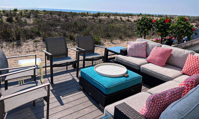 Rehoboth by the Sea House | Newly renovated beachfront townhome with lovely unique decor, firepit, & deck