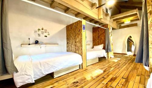 Single Bed in Dormitory Room