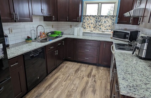 Levittown House | The Hexagon house in the Philadelphia suburbs. Sleeps 9, covered outdoor patio.